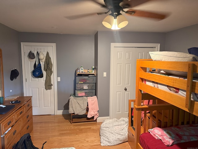 38 Padanaram Ave Unit 24, Danbury, CT 06811 - bedroom featuring light wood-type flooring, a ceiling fan, and a closet