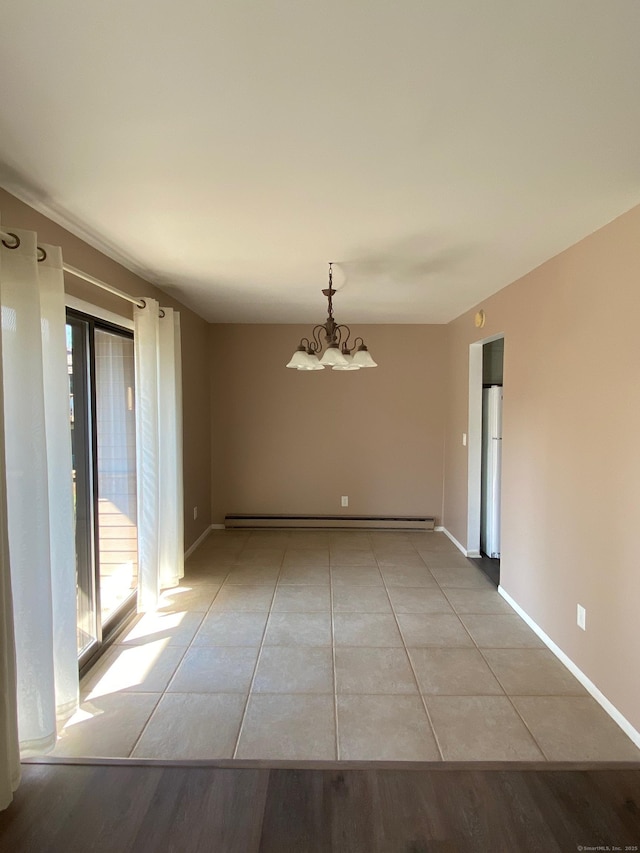 255 Strawberry Hill Ave Unit D4, Stamford, CT 06902 - empty room featuring a chandelier, a baseboard heating unit, and light tile patterned flooring