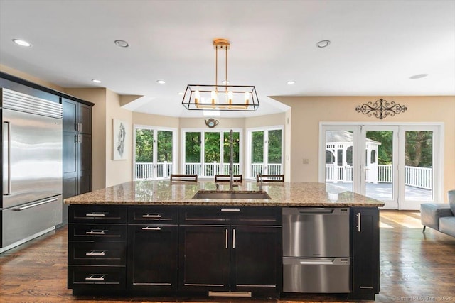1 Mountaincrest Dr, Cheshire, CT 06410 - kitchen featuring appliances with stainless steel finishes, plenty of natural light, light stone countertops, and recessed lighting