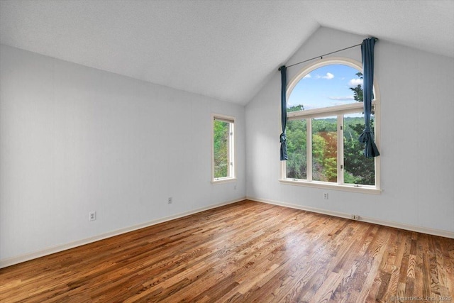 1 Mountaincrest Dr, Cheshire, CT 06410 - empty room with wood finished floors and lofted ceiling