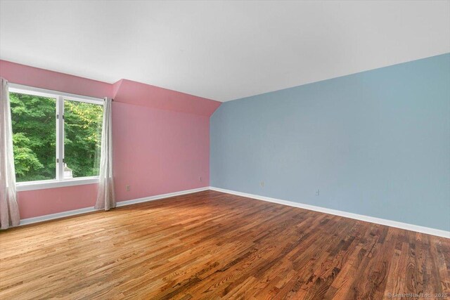 1 Mountaincrest Dr, Cheshire, CT 06410 - additional living space with wood finished floors and lofted ceiling