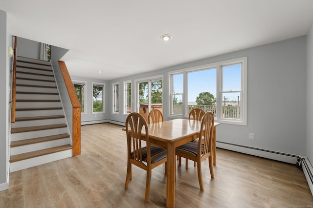 8 Griswold Dr, East Lyme, CT 06357 - dining space featuring stairway, light wood-type flooring, a baseboard radiator, and recessed lighting