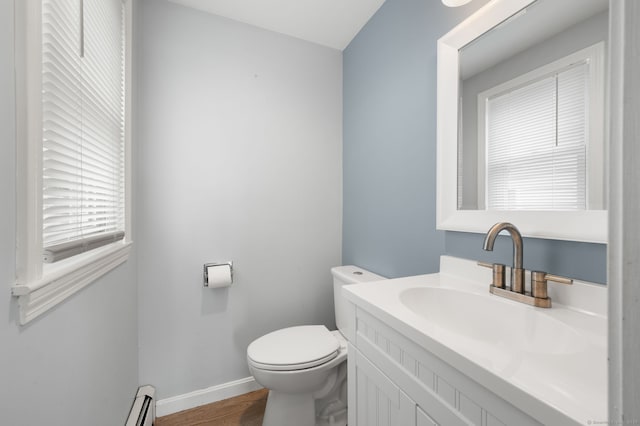 8 Griswold Dr, East Lyme, CT 06357 - half bath with vanity and wood finished floors