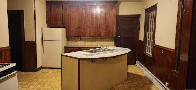 36 Connecticut Mills Ave, Killingly, CT 06239 - kitchen featuring freestanding refrigerator, tile countertops, a wainscoted wall, baseboard heating, and stove