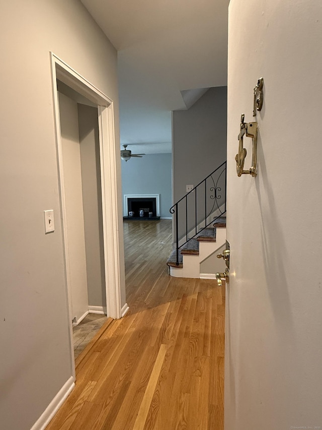 13 Hills Ln Unit 13, Westport, CT 06880 - hall featuring stairs and wood finished floors