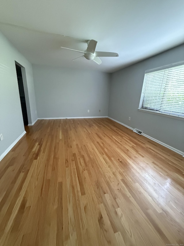 13 Hills Ln Unit 13, Westport, CT 06880 - spare room with a ceiling fan and light wood-type flooring