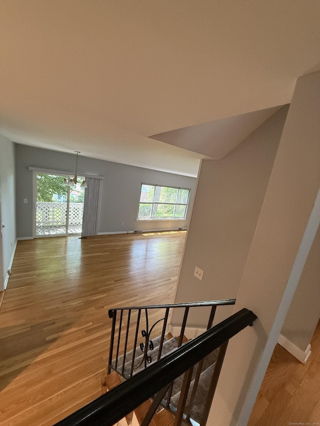 13 Hills Ln Unit 13, Westport, CT 06880 - stairway with plenty of natural light and wood finished floors