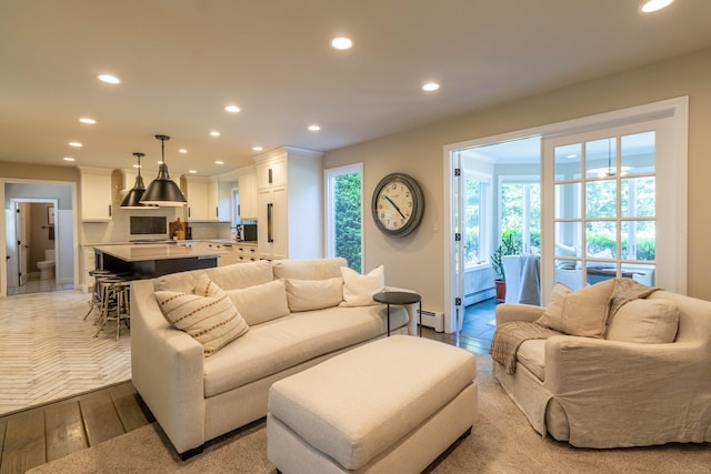 10 Brian Dr, Hebron, CT 06248 - living area featuring recessed lighting, baseboard heating, and light wood-style flooring
