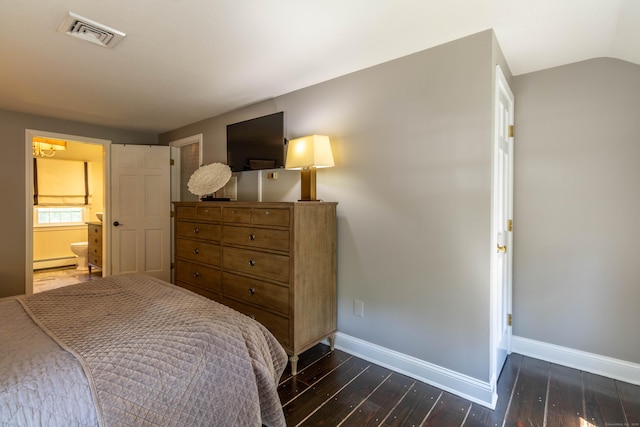 10 Brian Dr, Hebron, CT 06248 - bedroom featuring a baseboard heating unit, dark wood-style floors, ensuite bathroom, and lofted ceiling