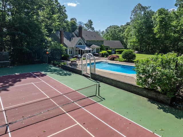 10 Brian Dr, Hebron, CT 06248 - view of tennis court featuring an outdoor pool