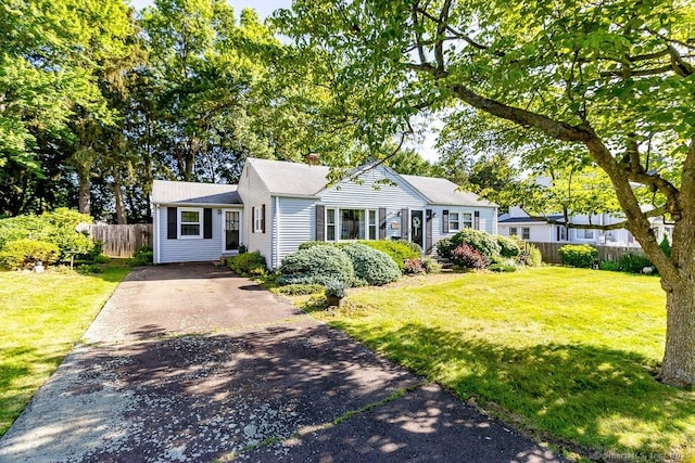 39 Mohawk Ln, Wethersfield, CT 06109 - ranch-style house featuring driveway and a chimney