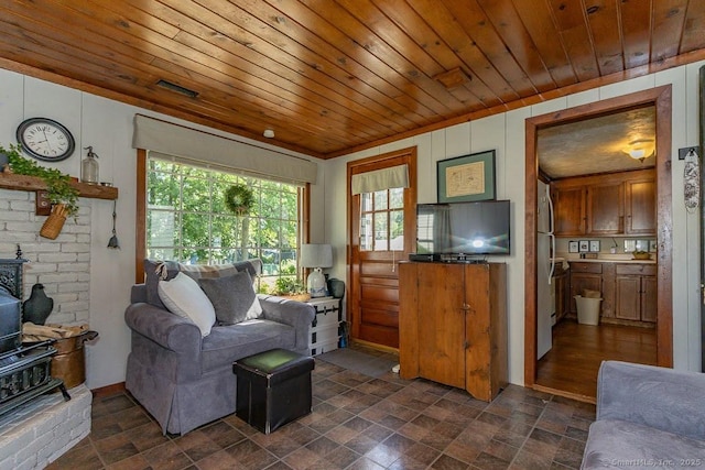39 Mohawk Ln, Wethersfield, CT 06109 - living area with dark stone finish flooring and wood ceiling