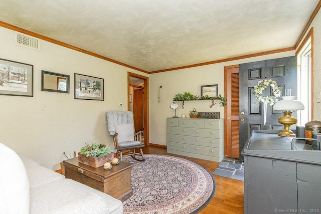 39 Mohawk Ln, Wethersfield, CT 06109 - living area with wood finished floors and ornamental molding