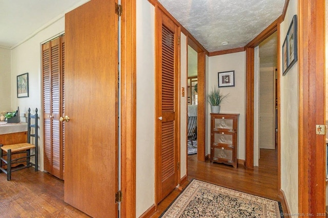 39 Mohawk Ln, Wethersfield, CT 06109 - hall featuring wood finished floors and ornamental molding