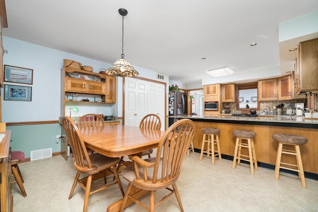 135 Harvest Woods Rd, Middlefield, CT 06481 - dining room with light floors and baseboards