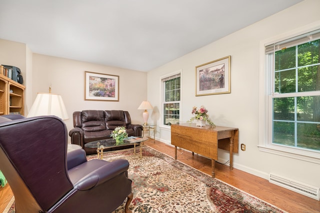 135 Harvest Woods Rd, Middlefield, CT 06481 - living room featuring wood finished floors and healthy amount of natural light