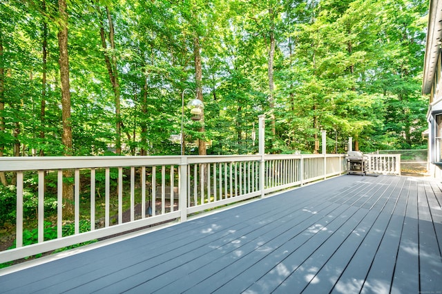 135 Harvest Woods Rd, Middlefield, CT 06481 - wooden deck featuring a grill and view of wooded area