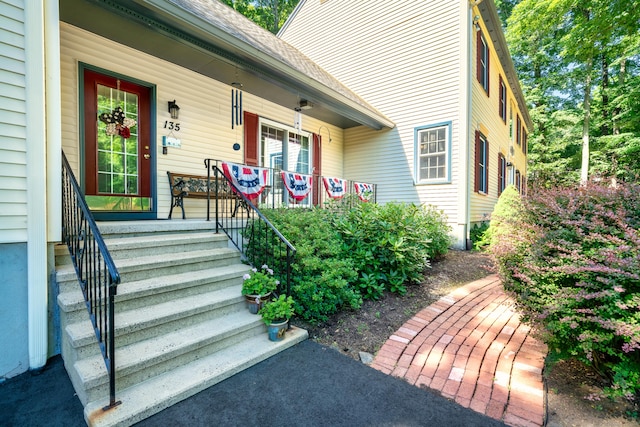 135 Harvest Woods Rd, Middlefield, CT 06481 - property entrance featuring covered porch and a shingled roof