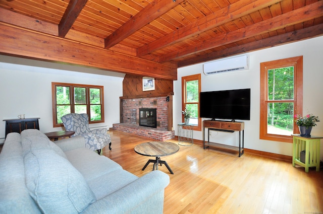11 Brianwood Ln, Granby, CT 06035 - living area featuring an AC wall unit, wood finished floors, a brick fireplace, plenty of natural light, and a wooden ceiling with exposed beams