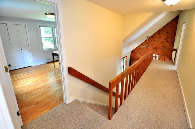 11 Brianwood Ln, Granby, CT 06035 - stairway with a baseboard radiator, wood walls, and wood finished floors