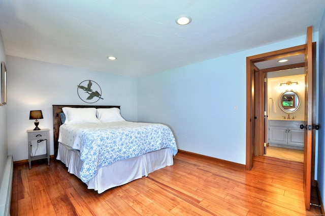 11 Brianwood Ln, Granby, CT 06035 - bedroom featuring light wood-style floors, recessed lighting, and a baseboard radiator