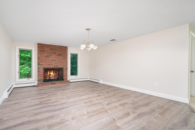 1037 Bartholomew Rd, Middletown, CT 06457 - unfurnished living room with wood finished floors, a chandelier, a baseboard radiator, and a brick fireplace