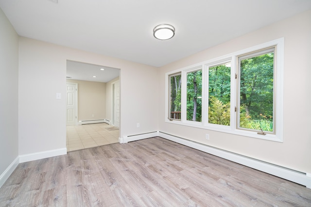 1037 Bartholomew Rd, Middletown, CT 06457 - empty room with a baseboard radiator, a baseboard heating unit, wood finished floors, and recessed lighting