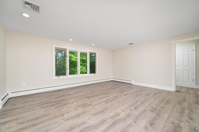 1037 Bartholomew Rd, Middletown, CT 06457 - spare room featuring light wood finished floors, a baseboard radiator, recessed lighting, and a baseboard heating unit