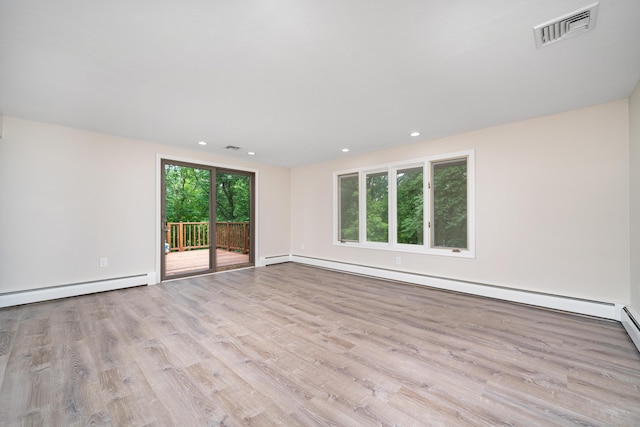 1037 Bartholomew Rd, Middletown, CT 06457 - unfurnished room featuring a baseboard radiator, wood finished floors, and recessed lighting