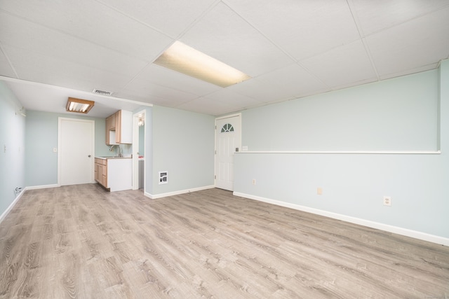 1037 Bartholomew Rd, Middletown, CT 06457 - unfurnished living room with light wood-style flooring and a sink