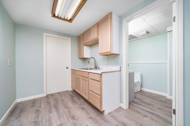 1037 Bartholomew Rd, Middletown, CT 06457 - kitchen featuring light brown cabinetry, light wood finished floors, and light countertops
