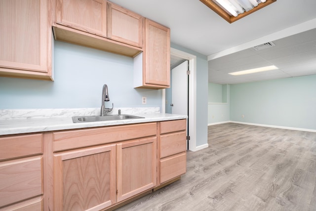 1037 Bartholomew Rd, Middletown, CT 06457 - kitchen featuring light brown cabinetry, light countertops, and light wood-type flooring