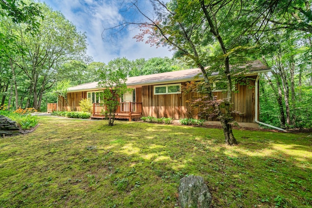 1037 Bartholomew Rd, Middletown, CT 06457 - view of front of home featuring a deck and a front lawn