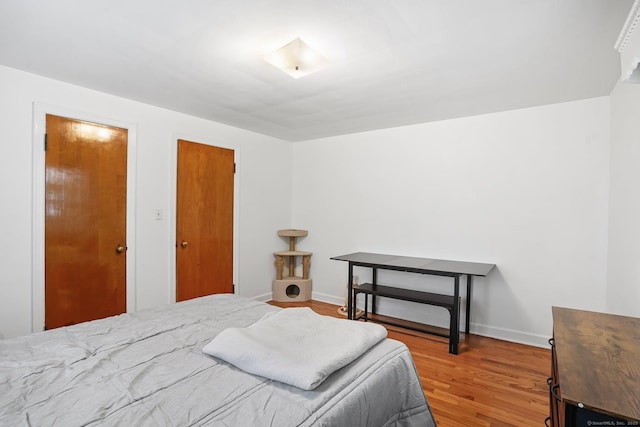 57 Lakeview Ave, Hamden, CT 06514 - bedroom with wood finished floors and baseboards