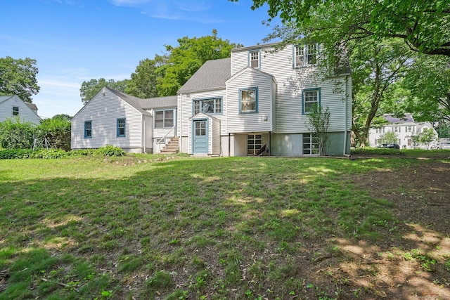 57 Lakeview Ave, Hamden, CT 06514 - back of property featuring a lawn and entry steps