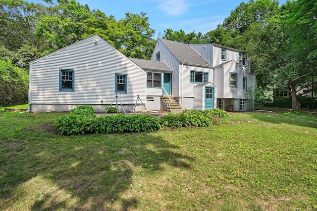 57 Lakeview Ave, Hamden, CT 06514 - back of house featuring a yard and a shingled roof