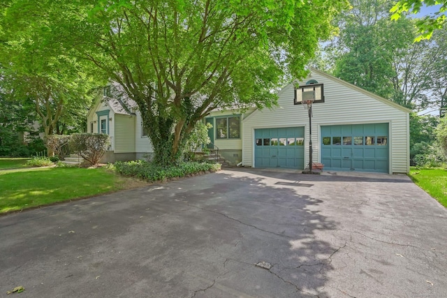 57 Lakeview Ave, Hamden, CT 06514 - view of front of house with a garage and a front yard