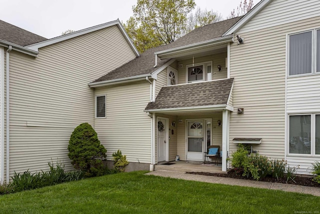24 Millbrook Ct Unit 24, Newington, CT 06111 - view of front facade featuring roof with shingles and a front yard