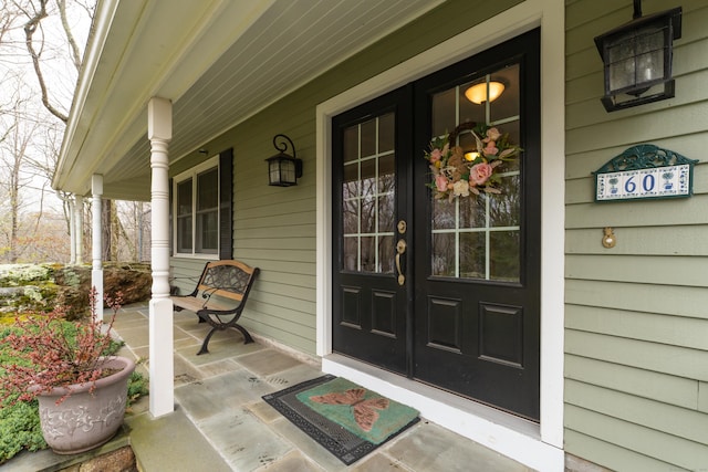 60 Ledgeview Ln, Guilford, CT 06437 - entrance to property with a porch and french doors
