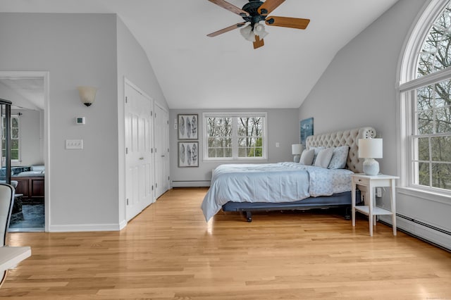 60 Ledgeview Ln, Guilford, CT 06437 - bedroom featuring lofted ceiling, baseboard heating, light wood-style floors, ceiling fan, and a baseboard radiator