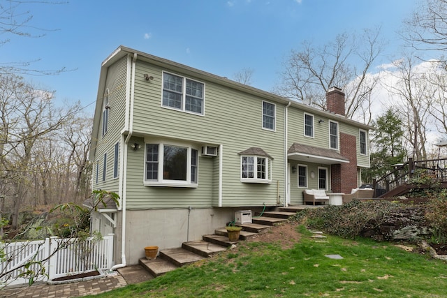 60 Ledgeview Ln, Guilford, CT 06437 - back of house with a chimney, stairs, and a deck