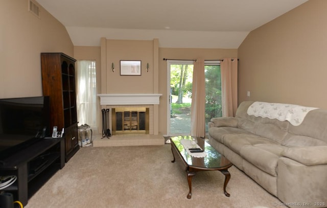 948 Heritage Vlg Unit A, Southbury, CT 06488 - carpeted living room featuring vaulted ceiling and a glass covered fireplace
