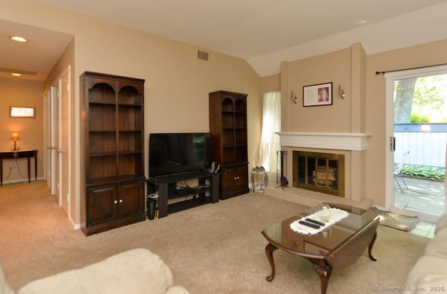 948 Heritage Vlg Unit A, Southbury, CT 06488 - living room featuring carpet floors, lofted ceiling, and a fireplace