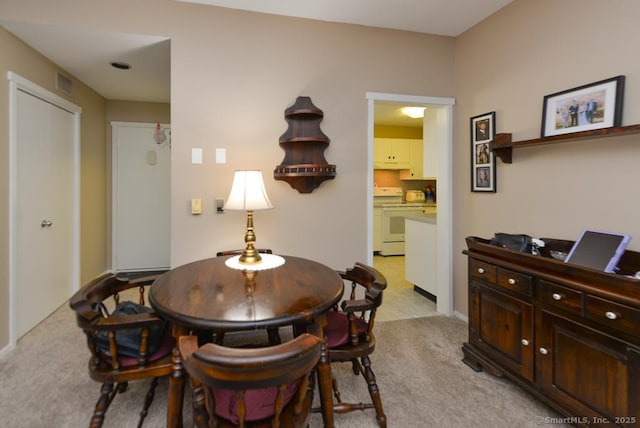 948 Heritage Vlg Unit A, Southbury, CT 06488 - dining room with light carpet