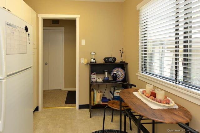 948 Heritage Vlg Unit A, Southbury, CT 06488 - dining room with healthy amount of natural light and light floors