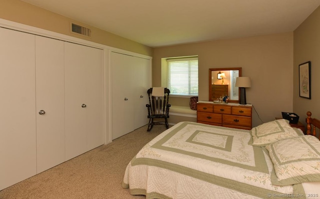 948 Heritage Vlg Unit A, Southbury, CT 06488 - bedroom with two closets and light carpet