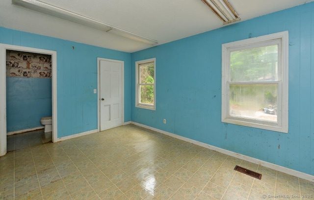 479 Kettletown Rd, Southbury, CT 06488 - empty room with tile patterned floors and baseboards