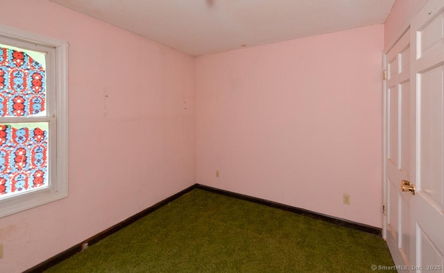 479 Kettletown Rd, Southbury, CT 06488 - spare room featuring healthy amount of natural light and dark colored carpet