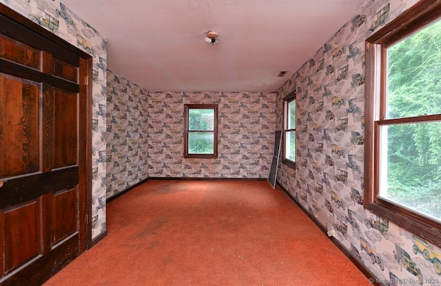 479 Kettletown Rd, Southbury, CT 06488 - empty room featuring carpet flooring and wallpapered walls