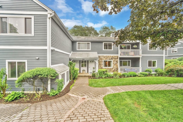 205 Windgate Cir Unit A, Monroe, CT 06468 - townhome / multi-family property featuring stone siding and a front lawn